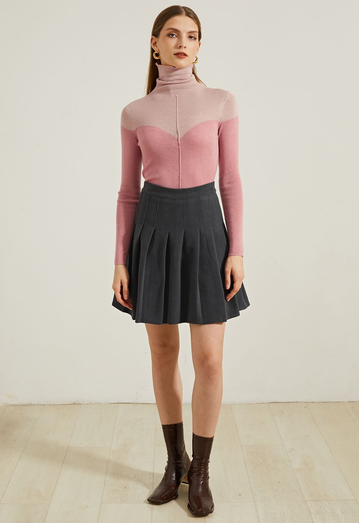 Haut en tricot ajusté bicolore à col roulé en rose