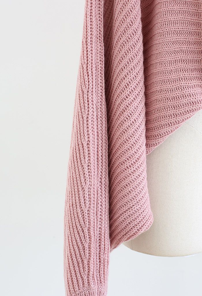 Pull en tricot à manches chauve-souris torsadées sur le devant en rose