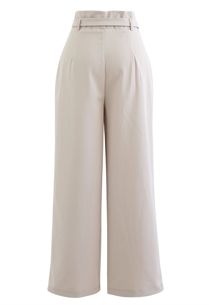 Pantalon droit ceinturé avec poches latérales en ivoire