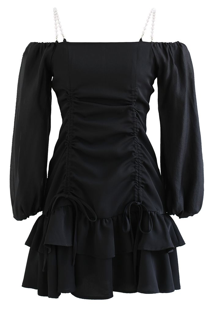 Mini robe à volants et épaules dénudées en noir