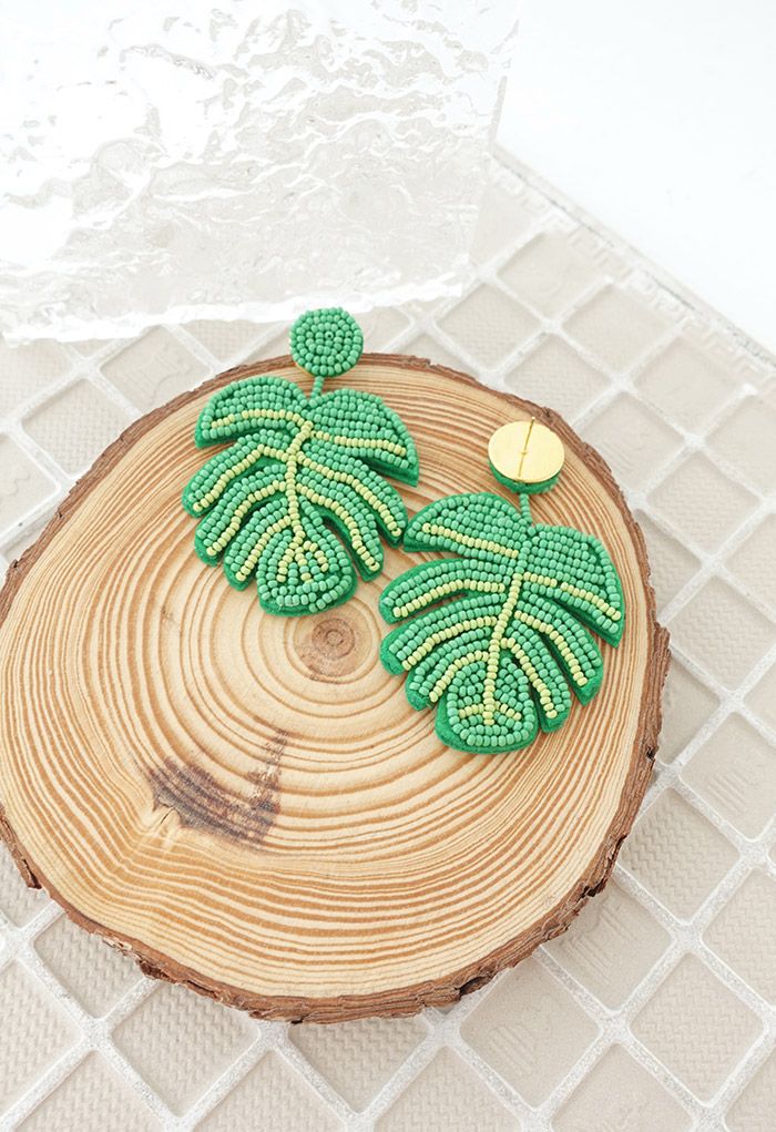 Boucles d'oreilles feuilles tropicales perlées