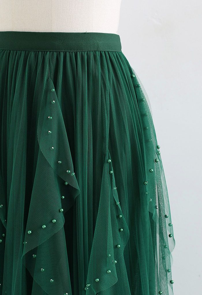 Jupe plissée en tulle à décor de perles dispersées en vert