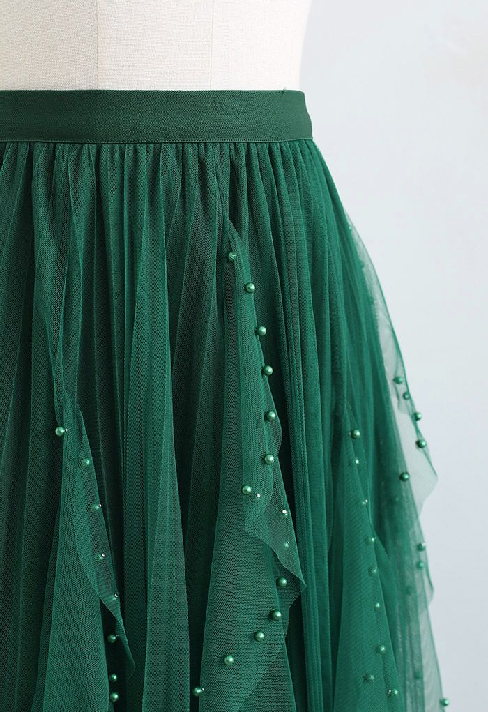 Jupe plissée en tulle à décor de perles dispersées en vert