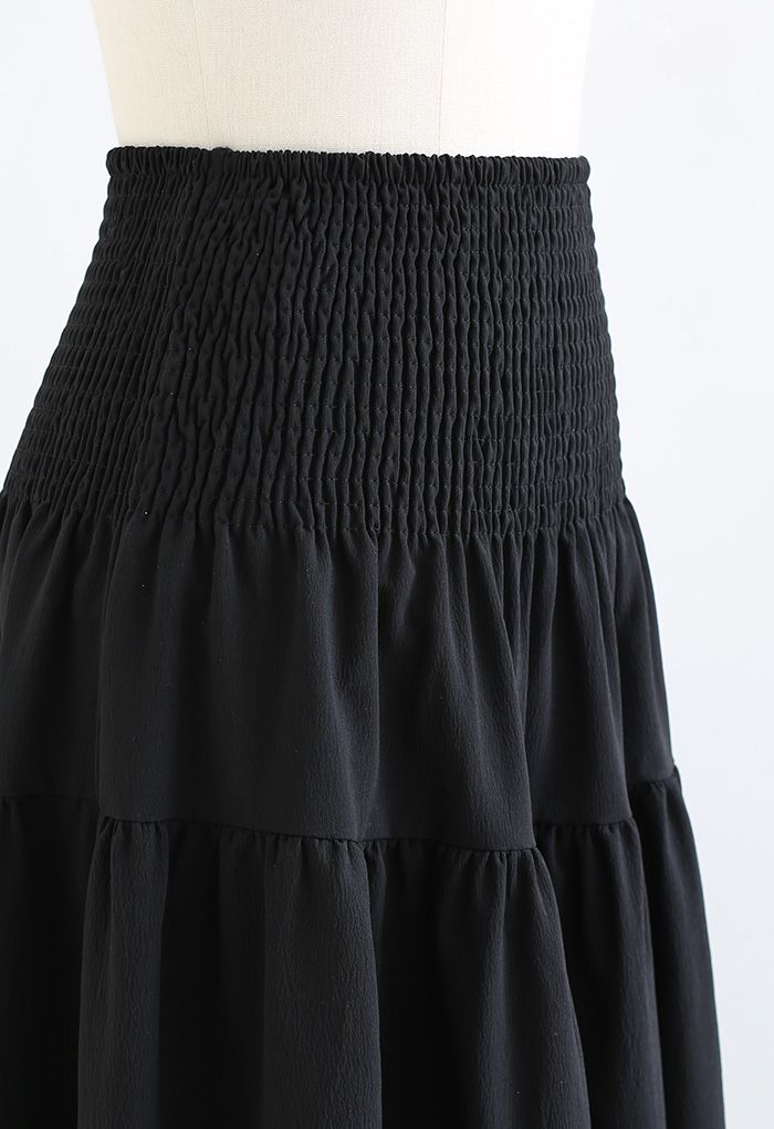 Jupe longue noire texturée à taille froncée