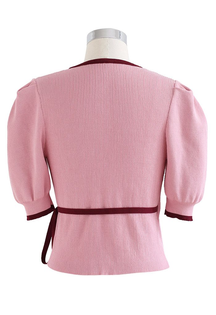 Haut cache-cœur en tricot à manches bouffantes et taille nouée en rose