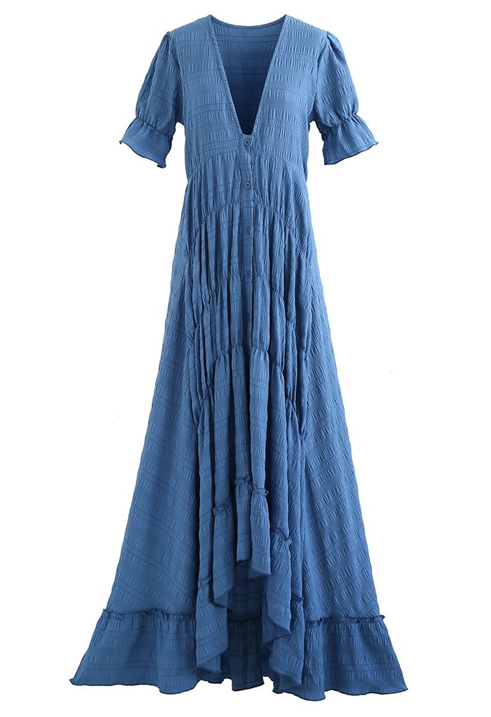 Robe longue à col en V profond et ourlet asymétrique en relief en bleu