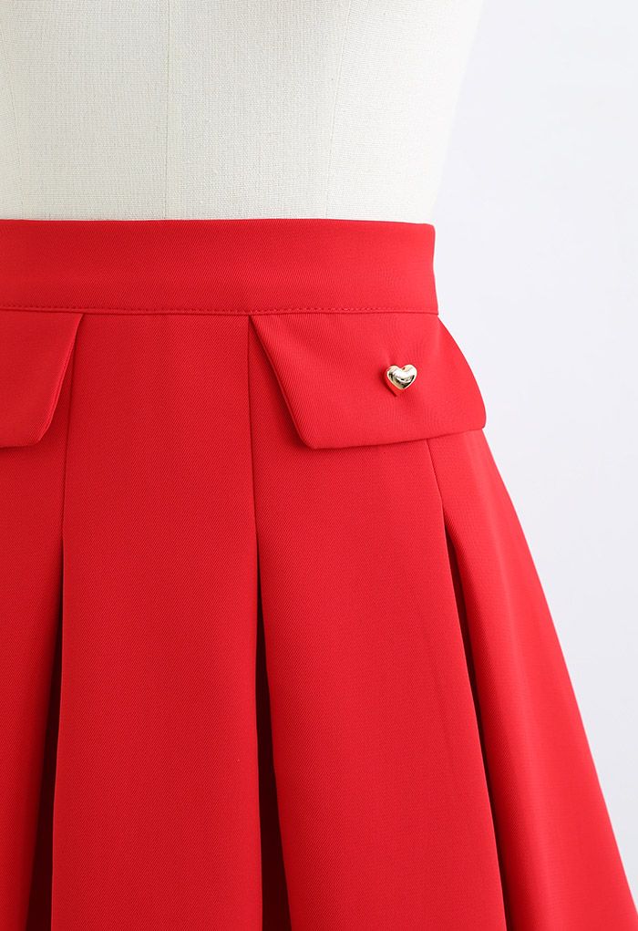 Mini-jupe plissée à boutons Tiny Heart en rouge