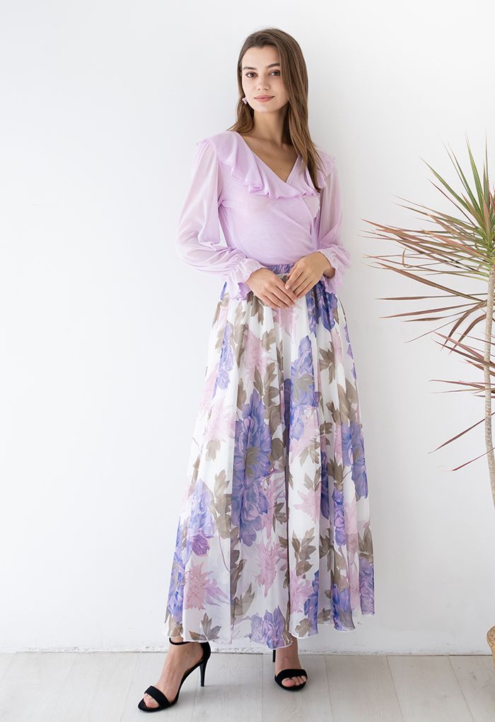 Jupe longue en mousseline de soie à imprimé de fleurs vibrantes en violet