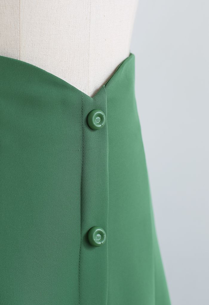 Jupe mi-longue évasée taille haute à boutons en vert