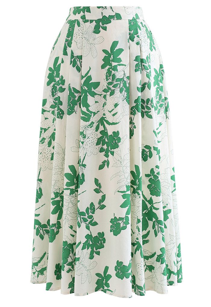 Jupe mi-longue verte en coton à fleurs et poche latérale