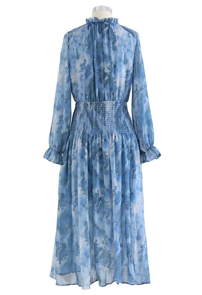 Robe mi-longue bleue à col en V et imprimé aquarelle