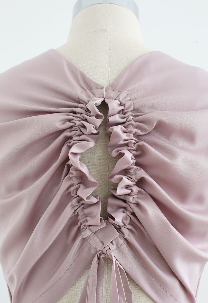Robe mi-longue en satin à dos ouvert avec cordon de serrage en vieux rose