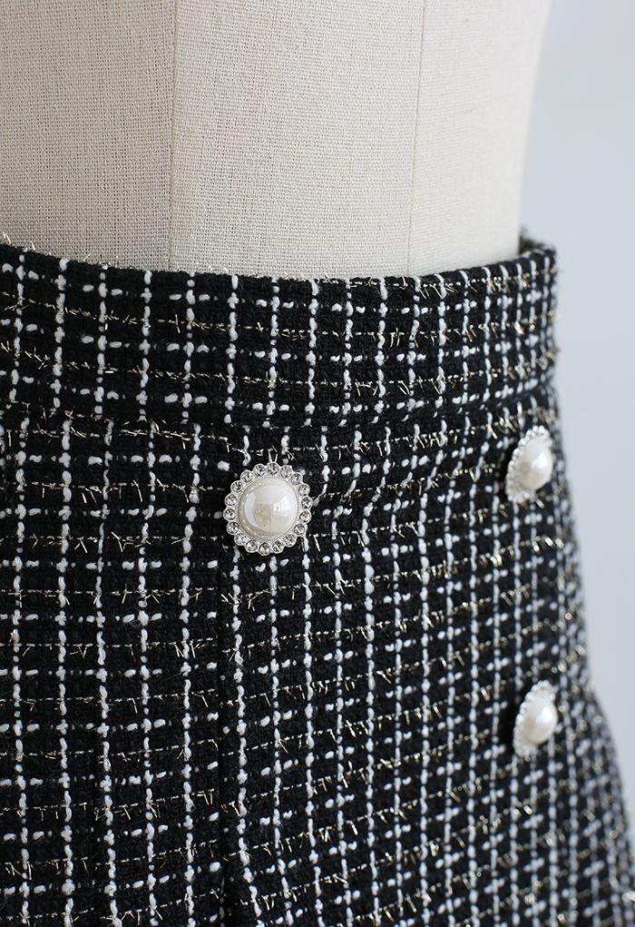 Mini-jupe en tweed à carreaux et boutons nacrés en noir