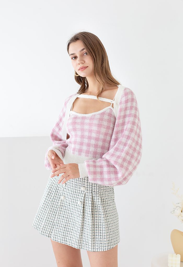 Mini-jupe en tweed à carreaux et boutons nacrés en blanc