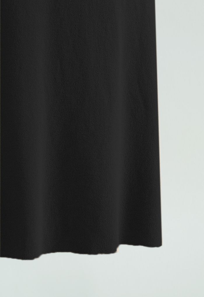 Robe en maille ajustée à col licou croisé en noir