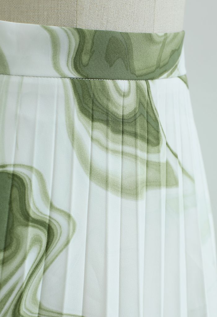 Jupe mi-longue plissée à imprimé tourbillon aquarelle en vert