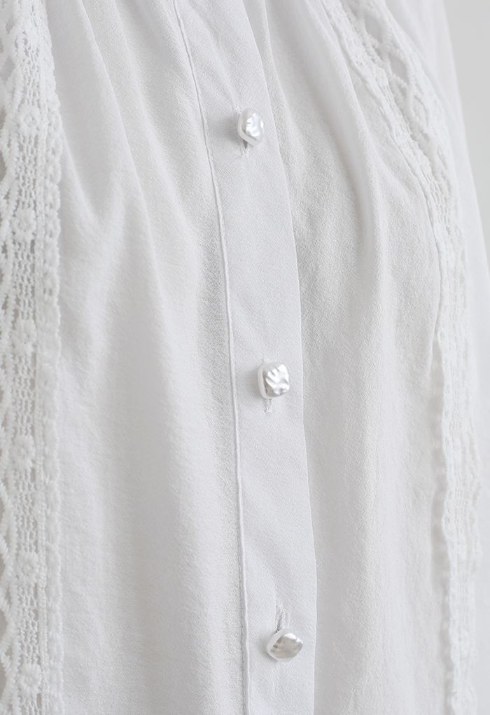 Chemise ample à manches bouffantes et bordure en crochet en blanc