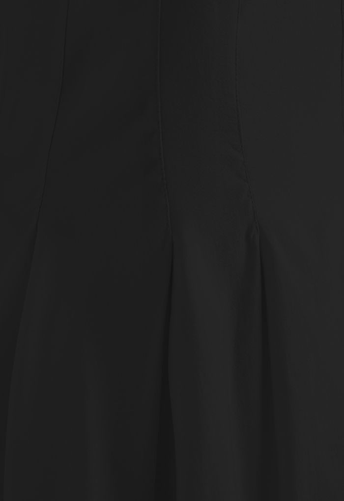 Robe caraco à coutures ajustées et évasées en noir