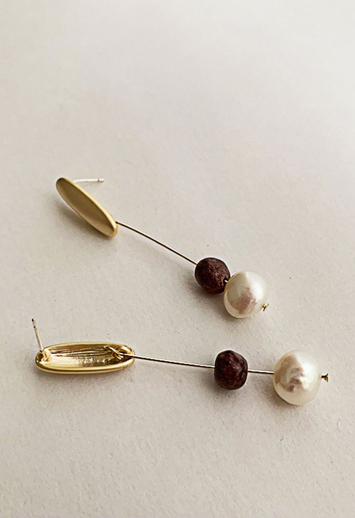 Boucles d'oreilles pendantes en métal avec pierre et perle