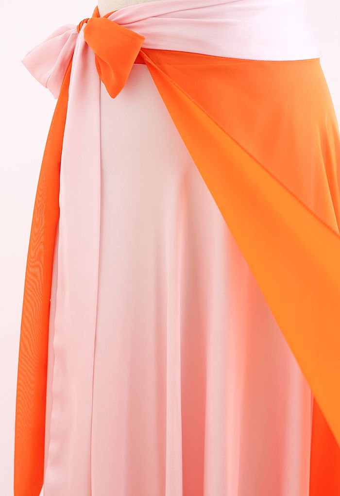 Jupe longue portefeuille épissée à taille nouée en orange