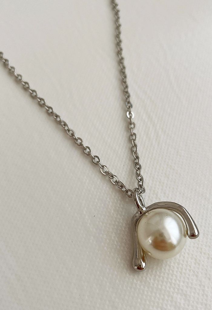 Collier pendentif perle géométrique