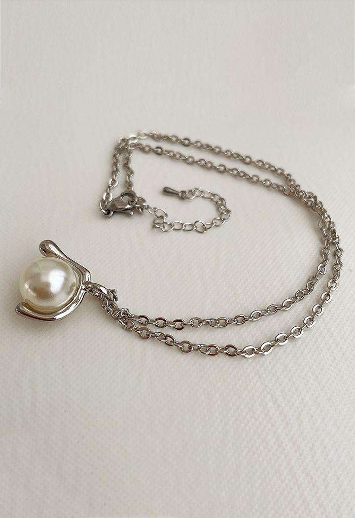 Collier pendentif perle géométrique