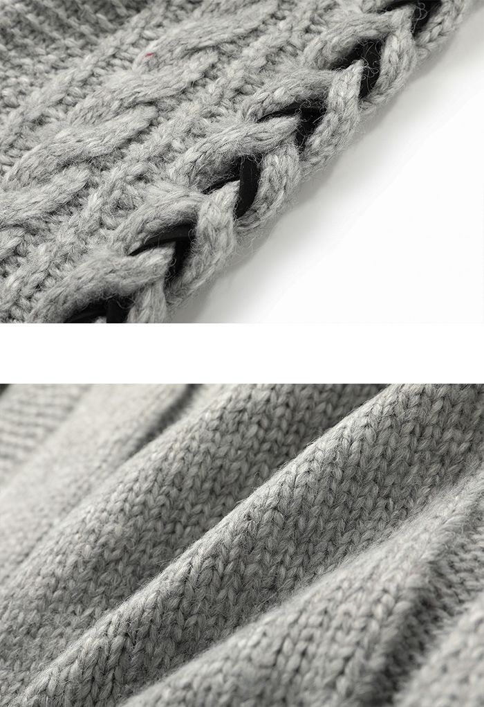Pull court en tricot tressé à manches à lacets en gris