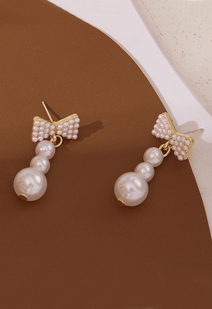 Boucles d'oreilles pendantes en forme de nœud papillon