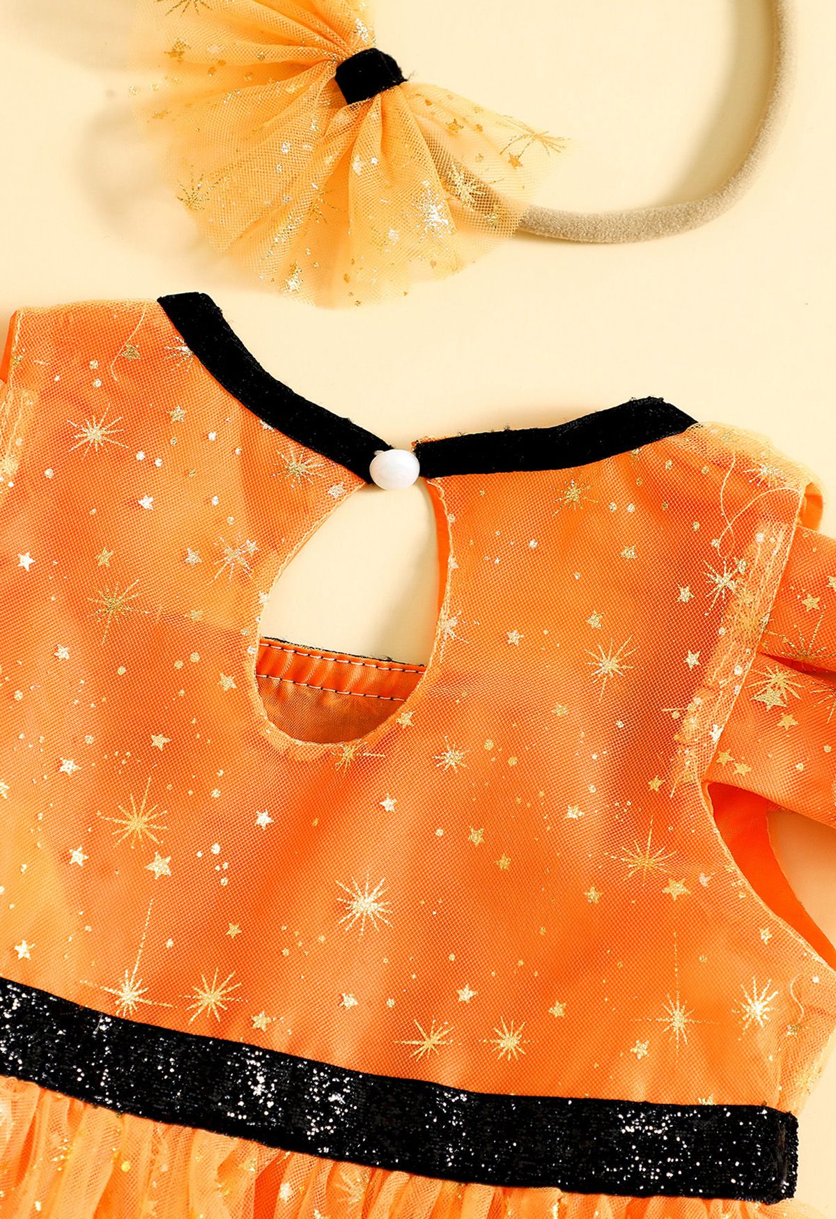Robe en maille étoiles filantes pour toute-petite fille avec bandeau nœud papillon