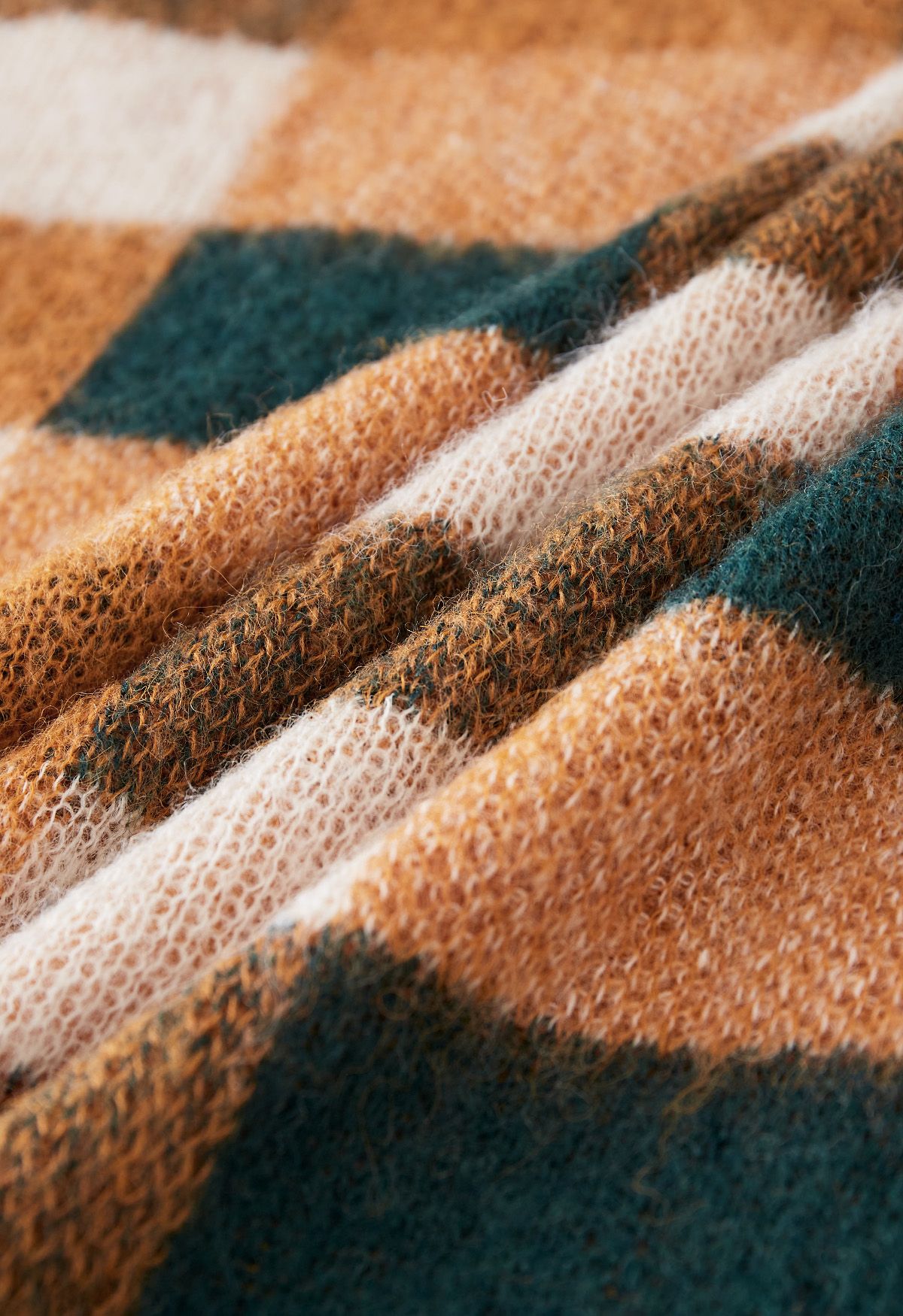 Pull en tricot flou à carreaux colorés