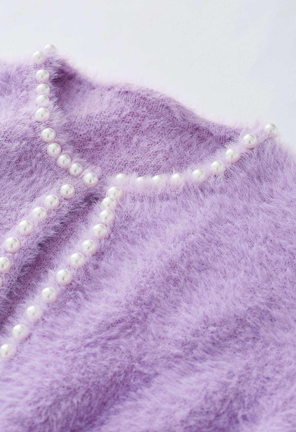 Cardigan ouvert en tricot pelucheux nacré en lilas