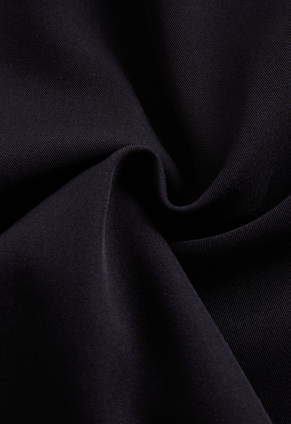Jupe trapèze plissée boutonnée en noir