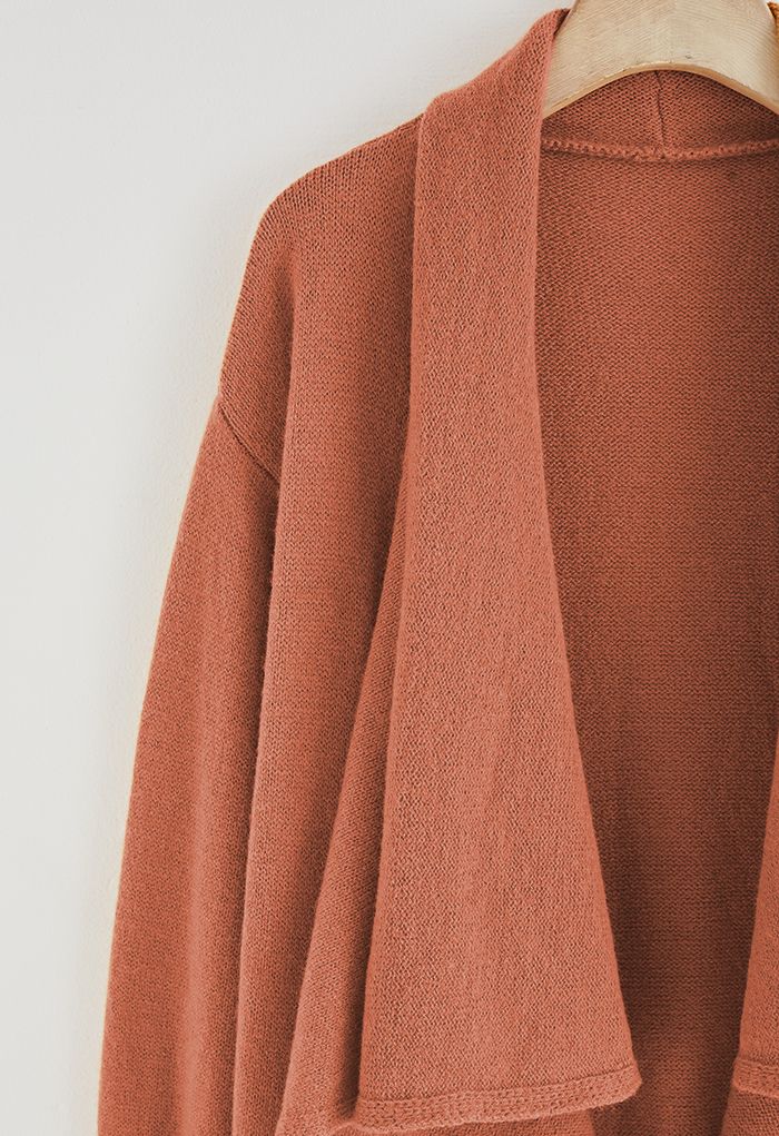 Cardigan long en tricot cascade en orange