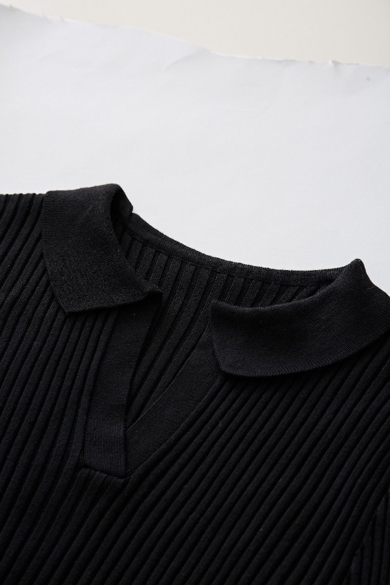 Ensemble haut en tricot à col en V et jupe plissée en noir