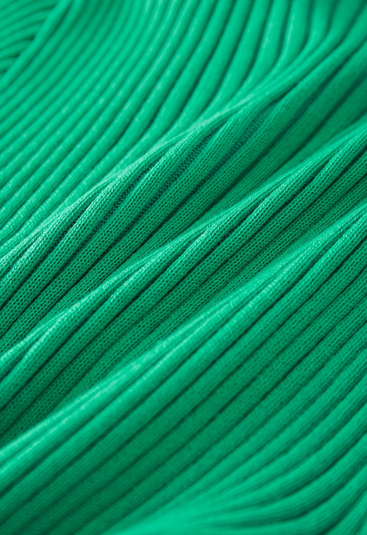 Ensemble haut en tricot à col en V et jupe plissée en vert