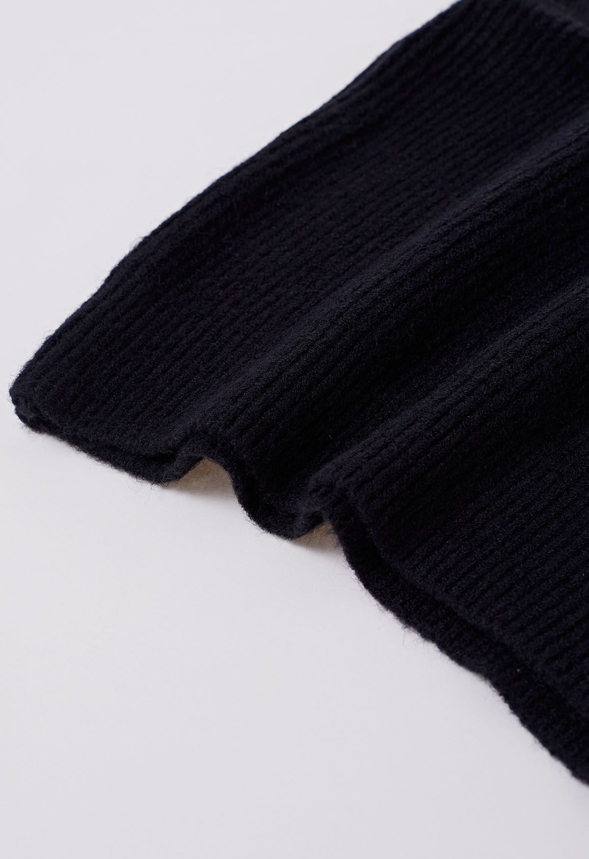 Gilet en tricot à col roulé uni en noir