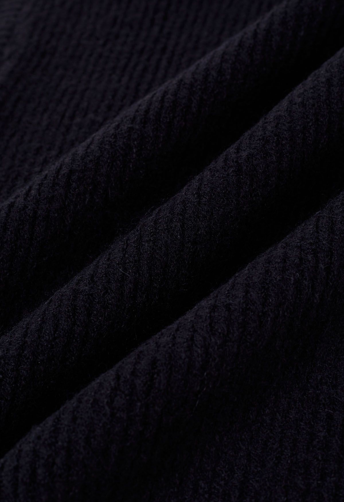 Gilet en tricot à col roulé uni en noir