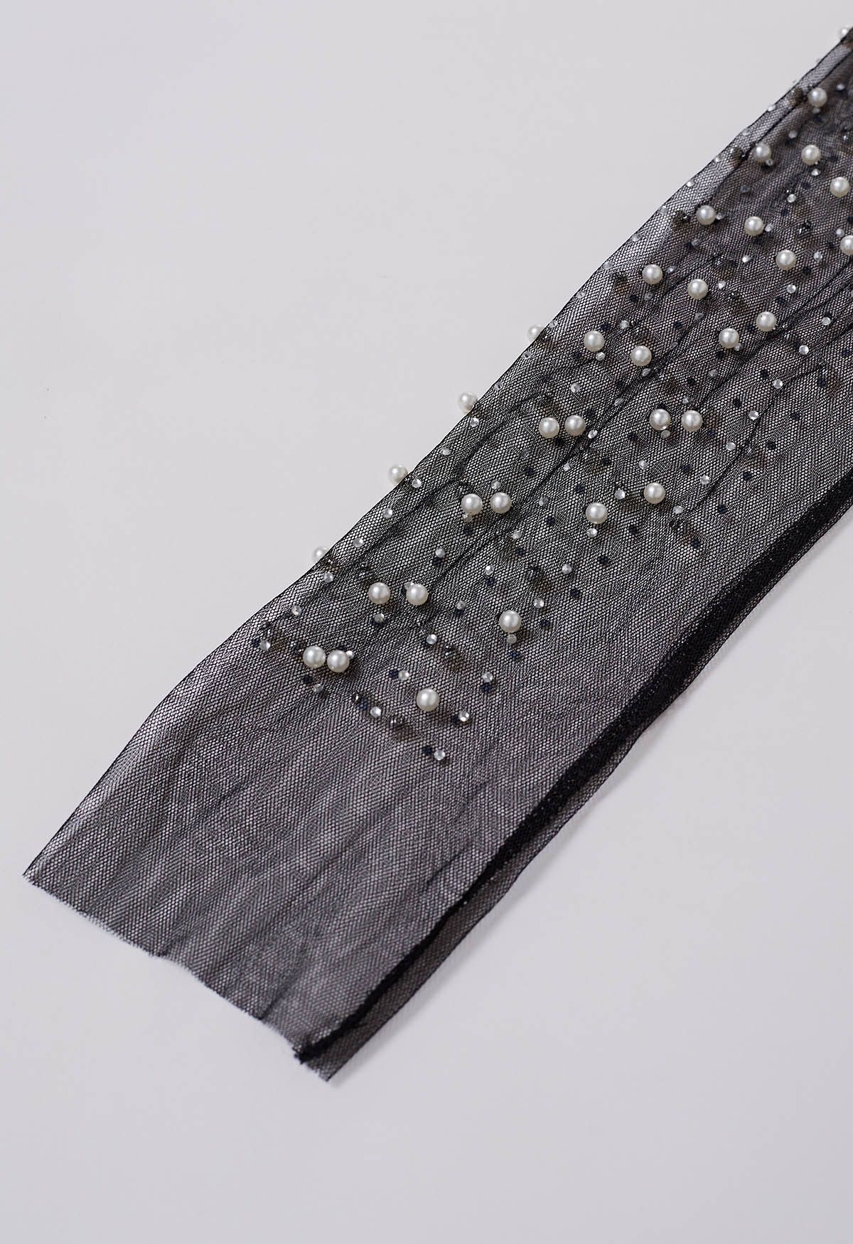 Haut en maille transparente orné de perles complètes en noir
