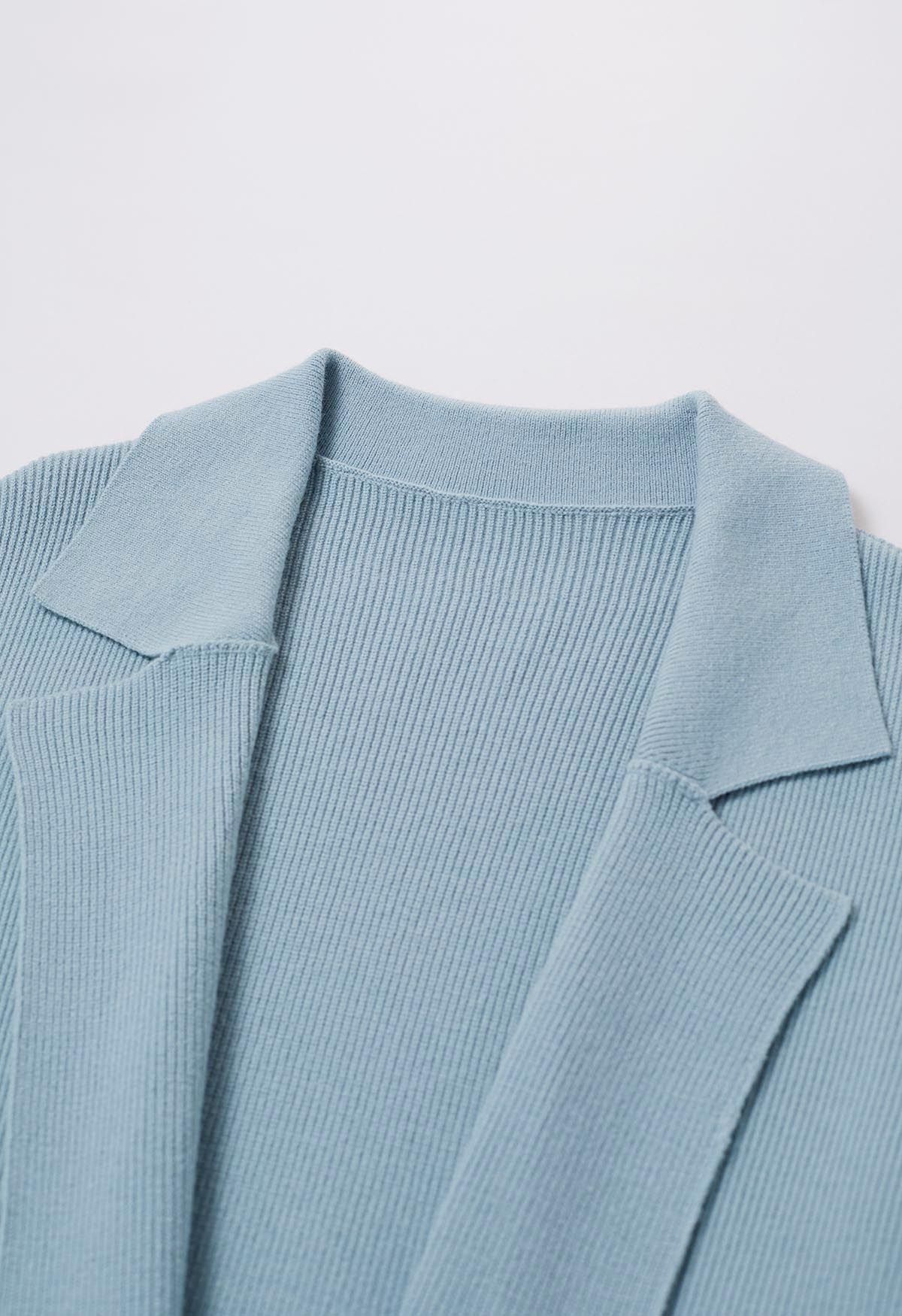Cardigan long en tricot avec ceinture et revers cranté en bleu