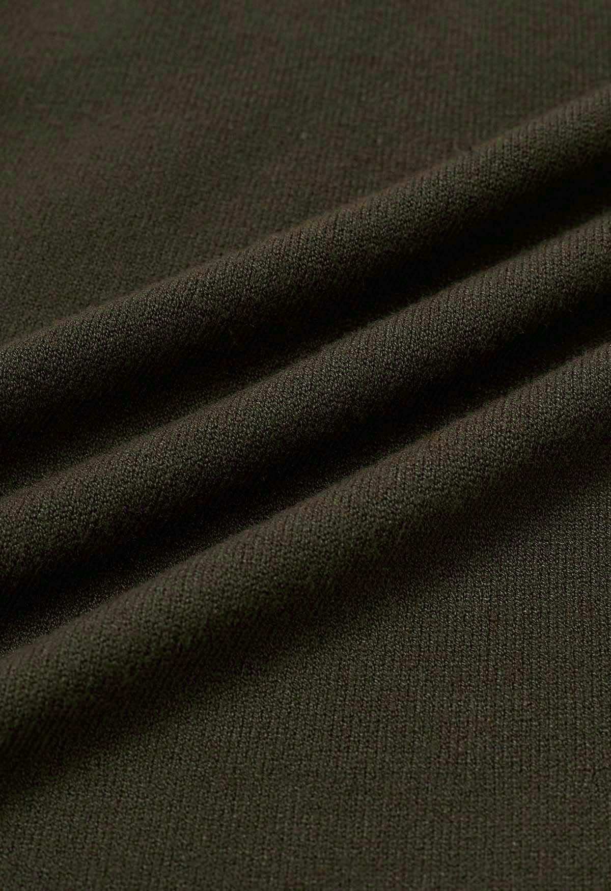 Jupe mi-longue en tricot ajouré avec ourlet en zigzag en vert armée