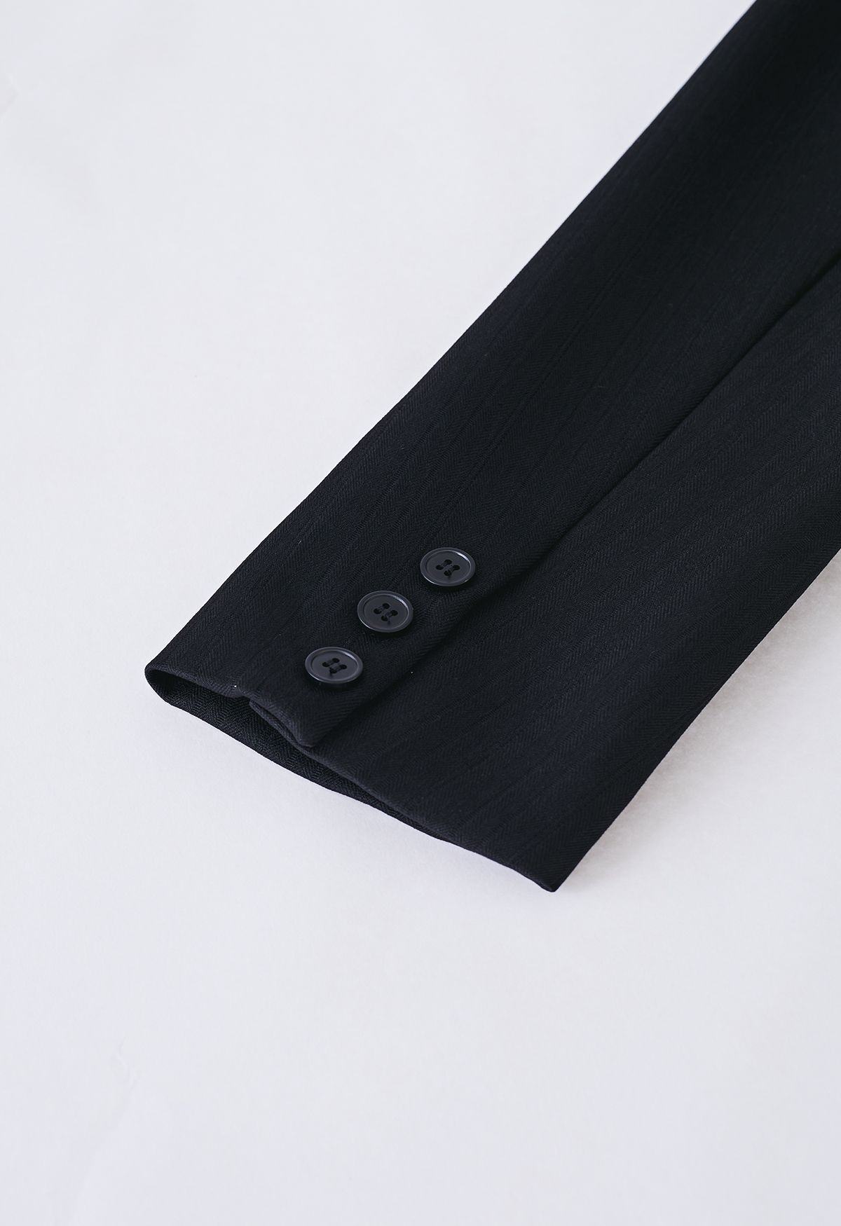 Blazer à double boutonnage texturé de couleur unie en noir
