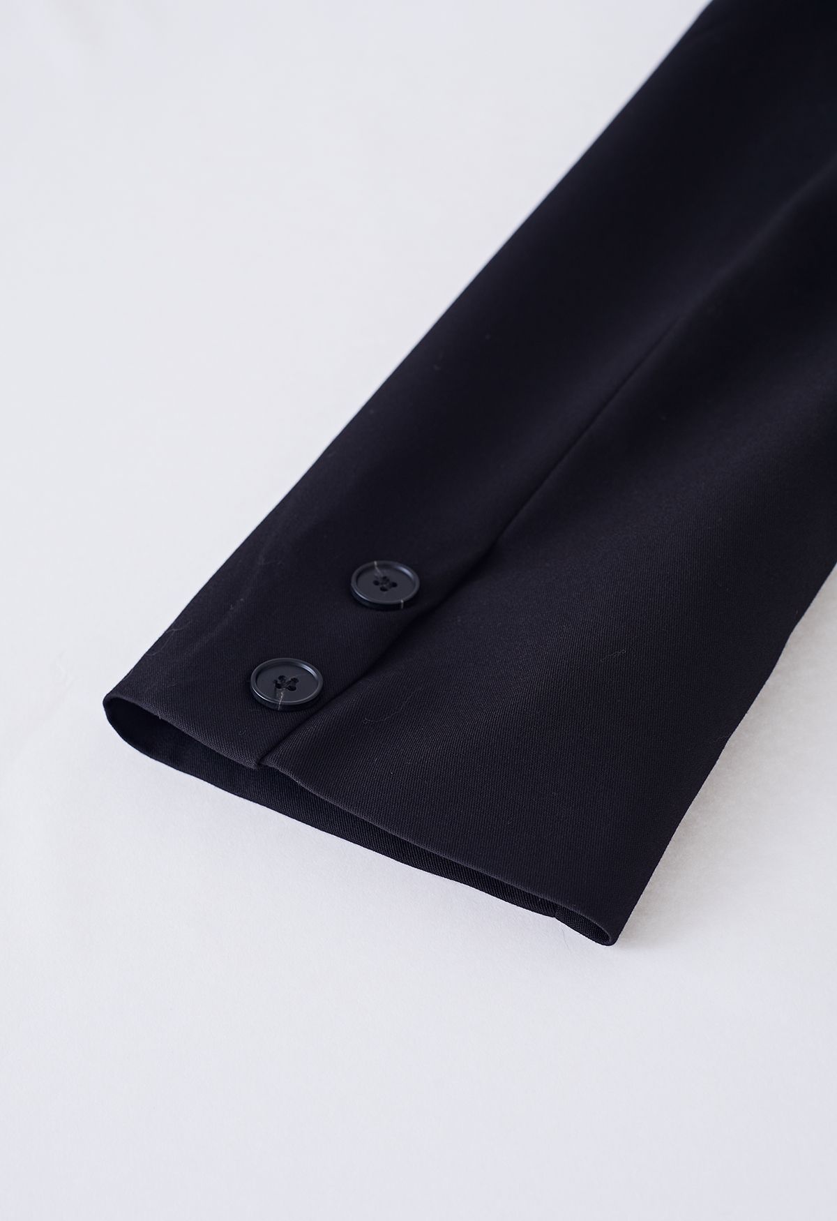 Blazer à simple boutonnage à plis latéraux en noir