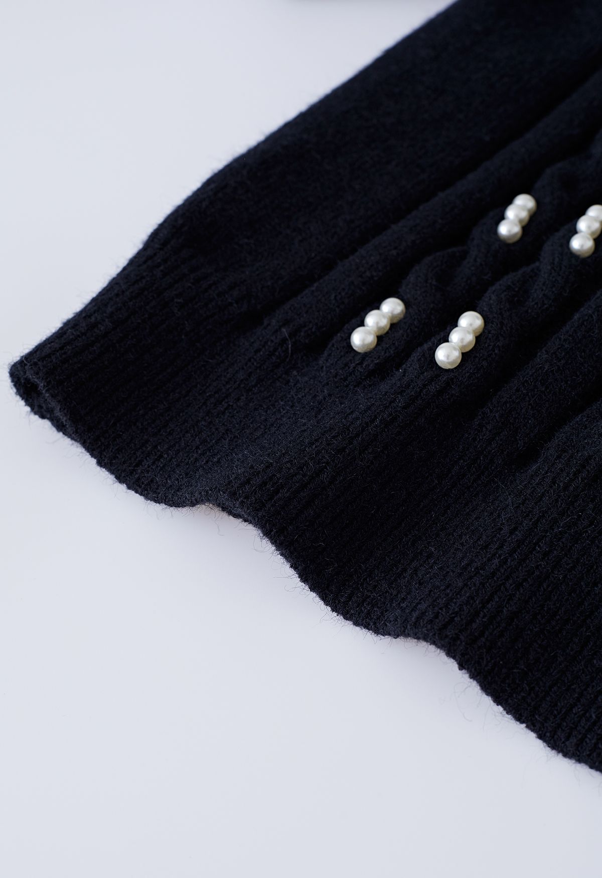 Haut en tricot tressé orné de perles en noir