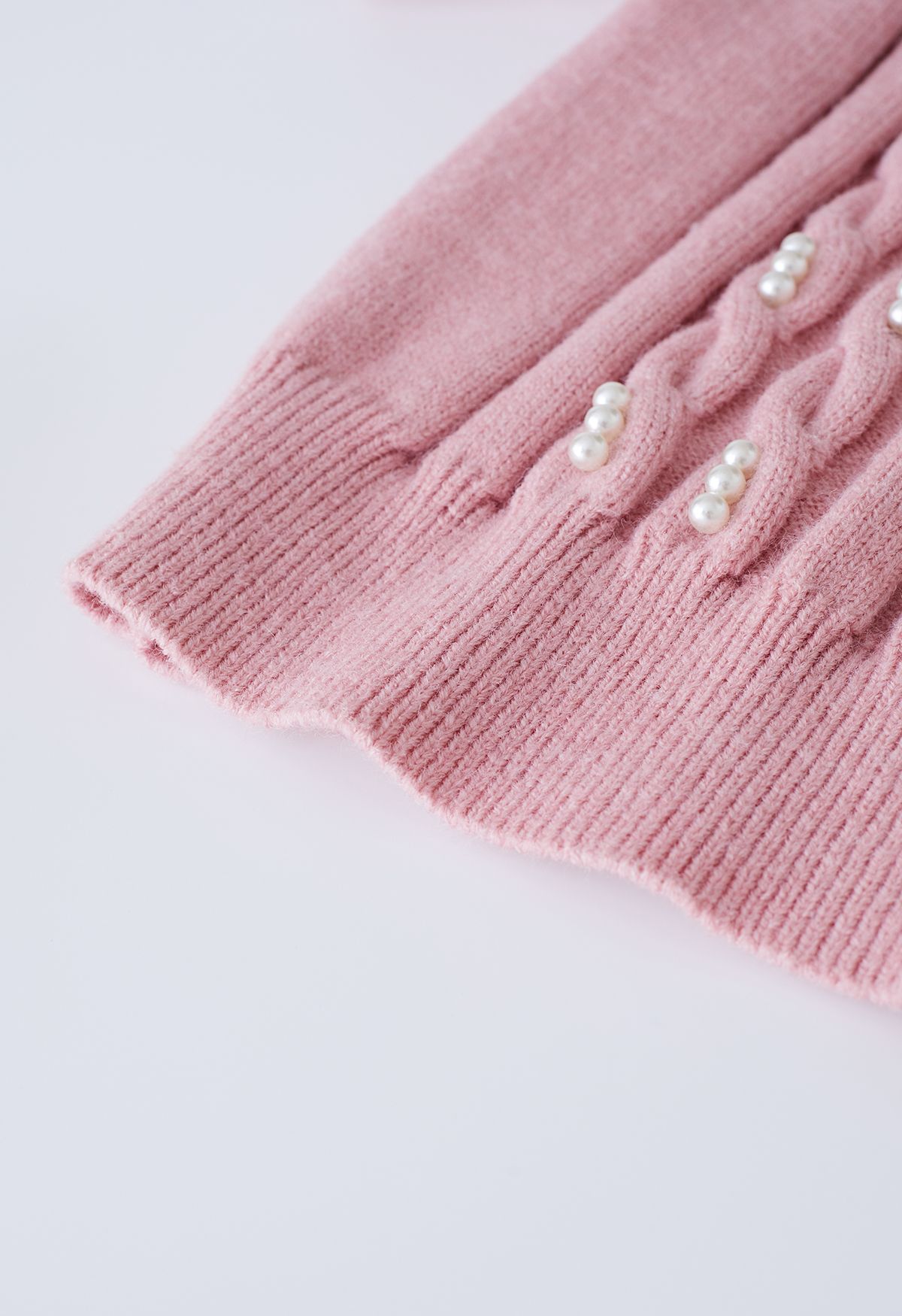Haut en tricot tressé orné de perles en rose