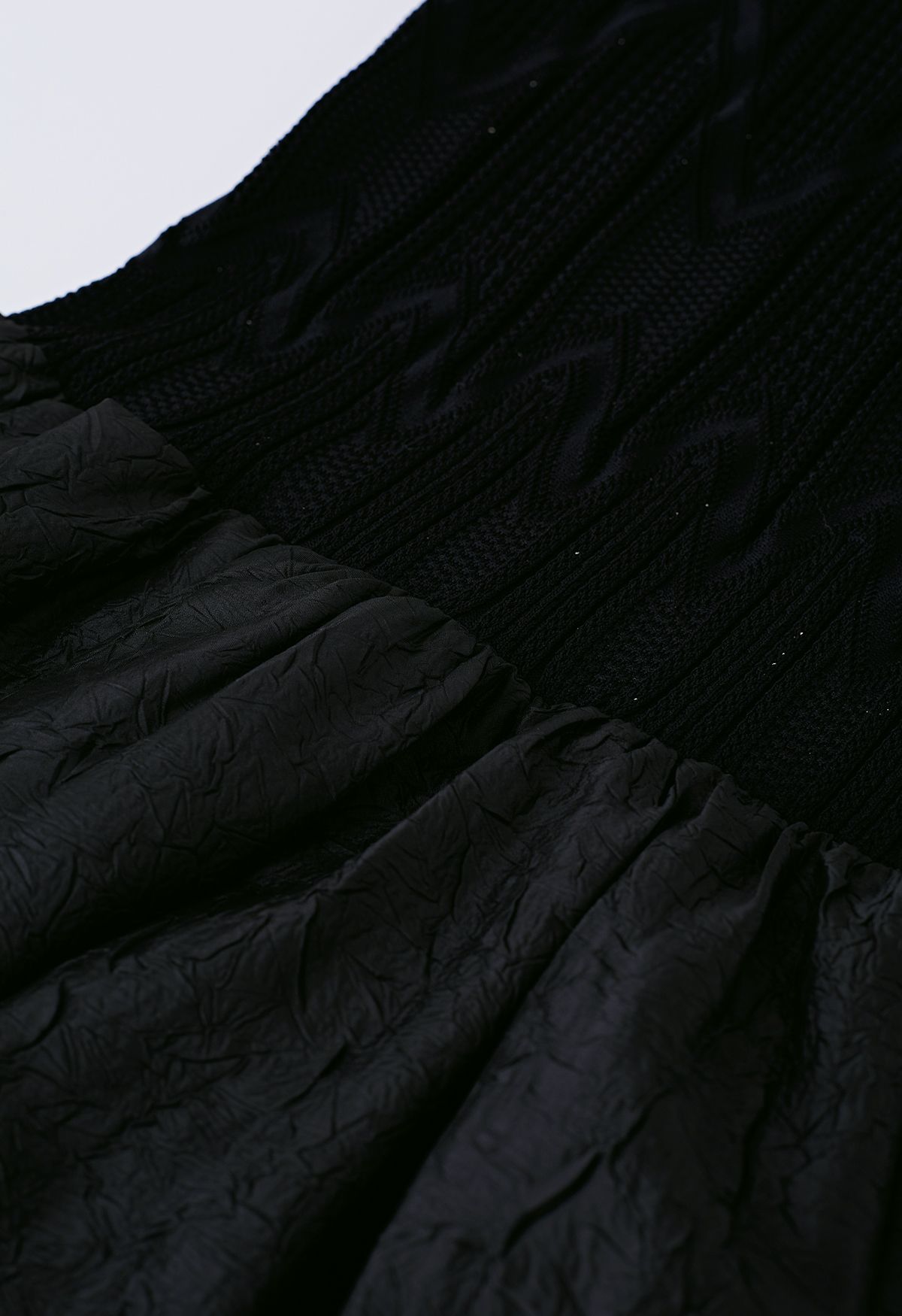 Robe sans manches en tricot à texture épissée en noir