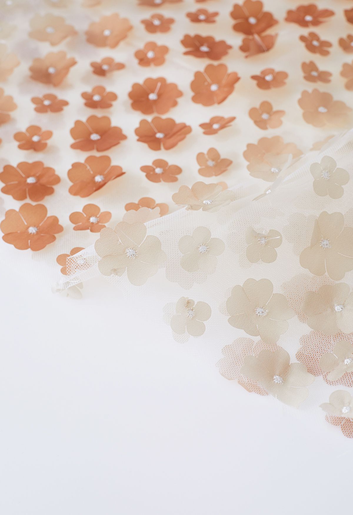 Jupe en maille double épaisseur à fleurs 3D dégradées en abricot