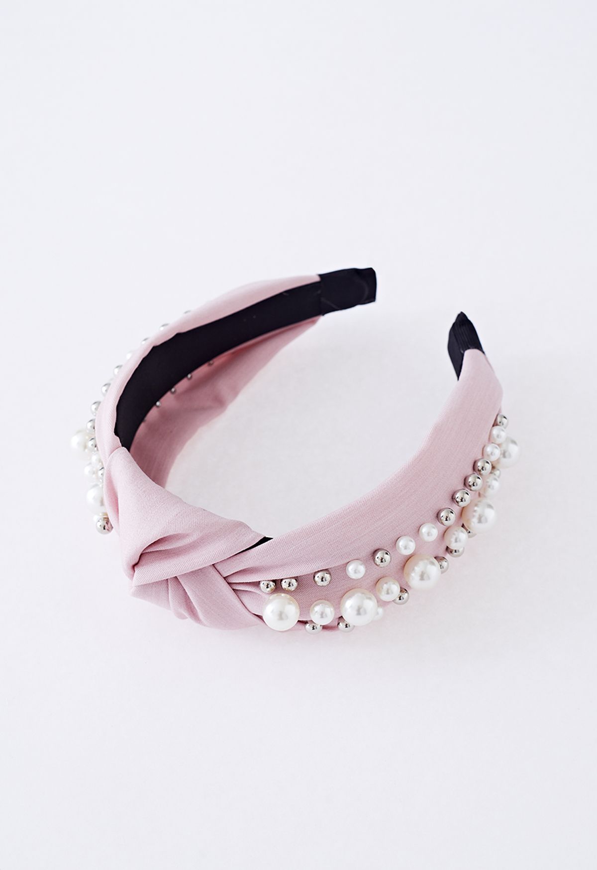 Bandeau en tissu perlé à décor de perles en rose