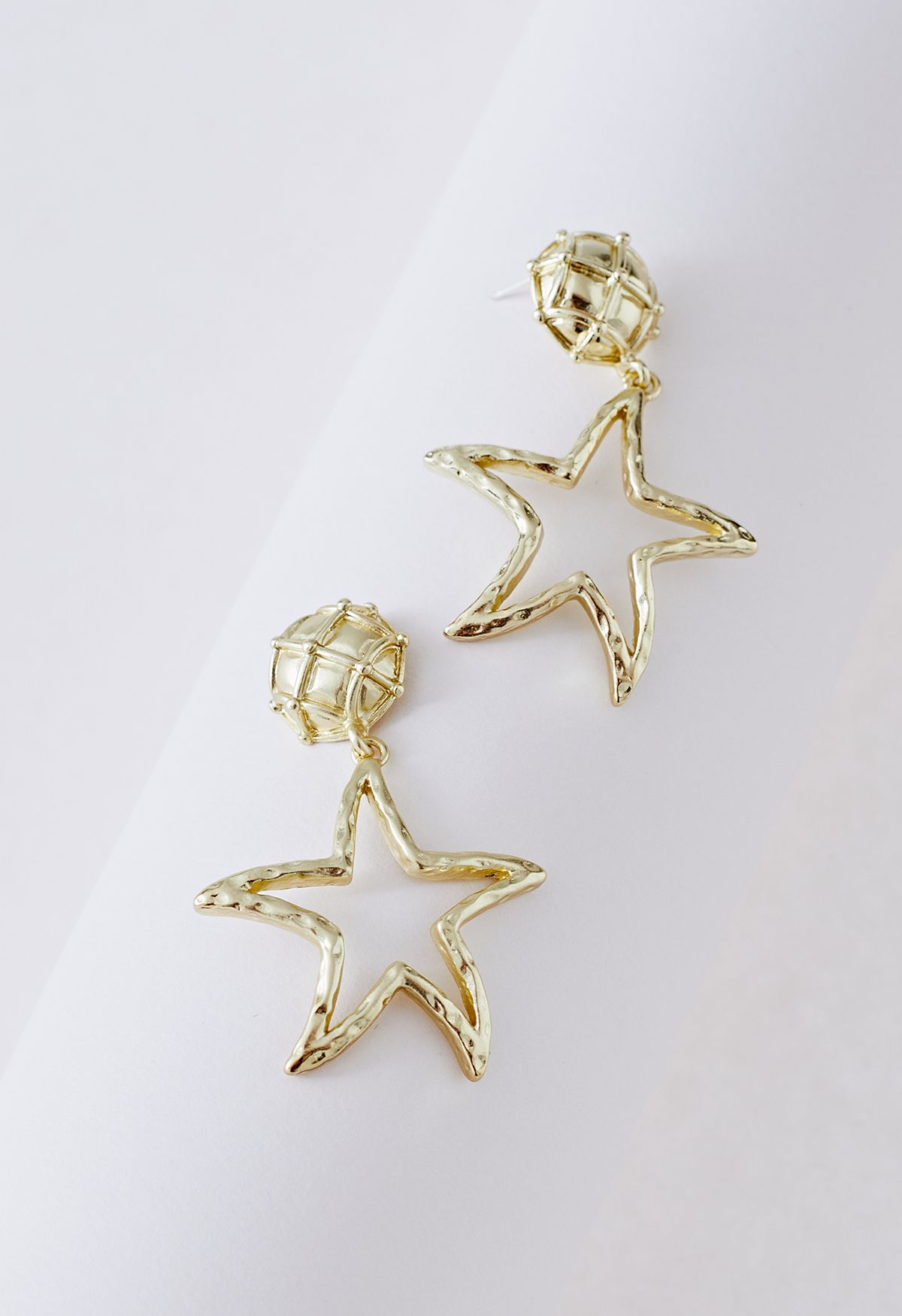 Boucles d'oreilles évidées étoile de mer dorée