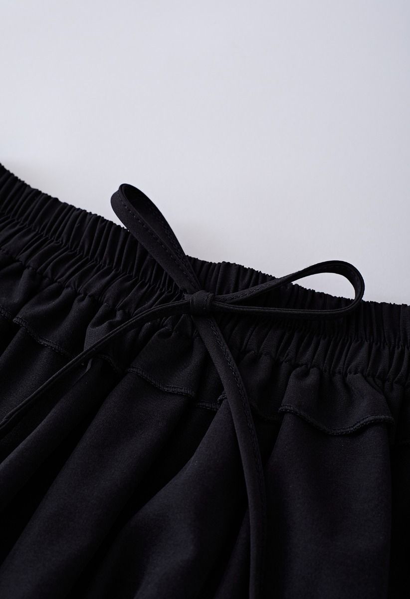 Mini jupe à volants en noir