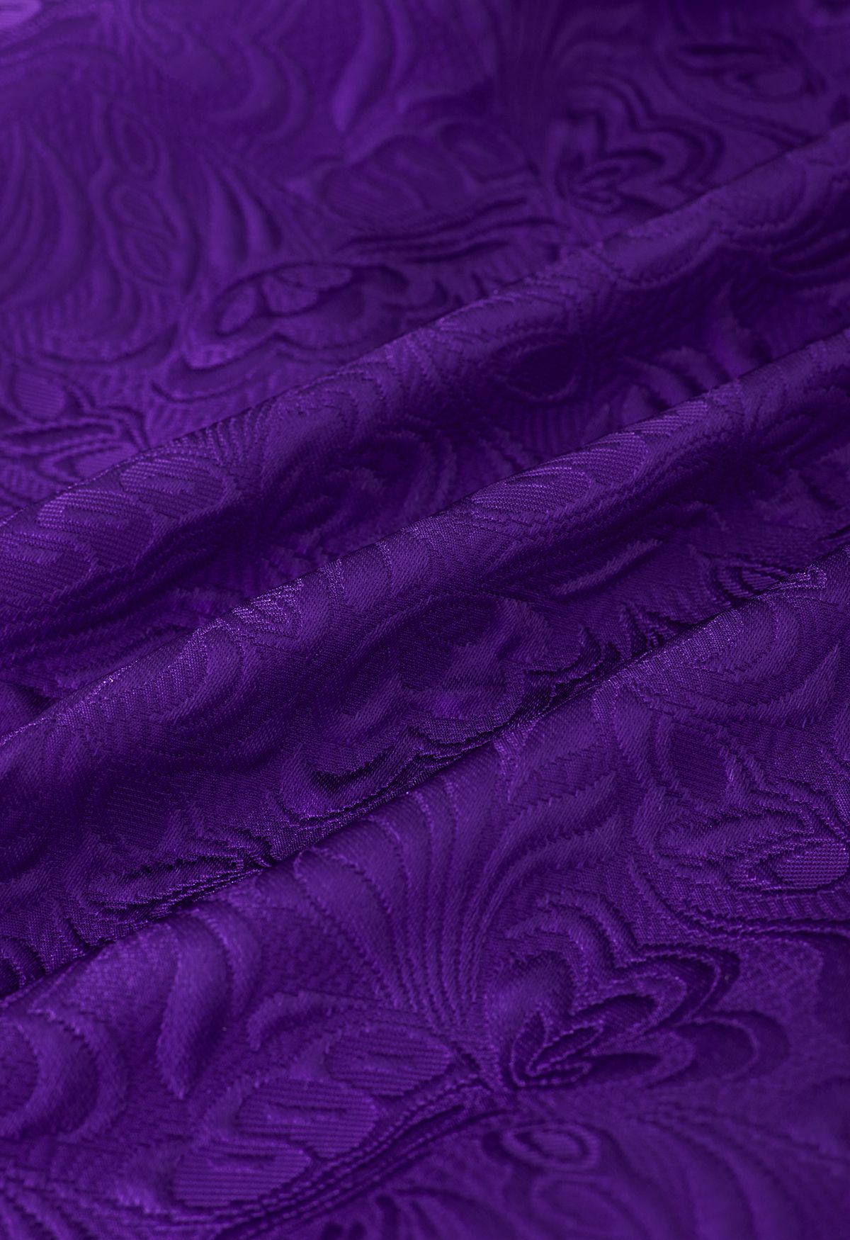 Jupe mi-longue Noble en jacquard floral en relief en violet
